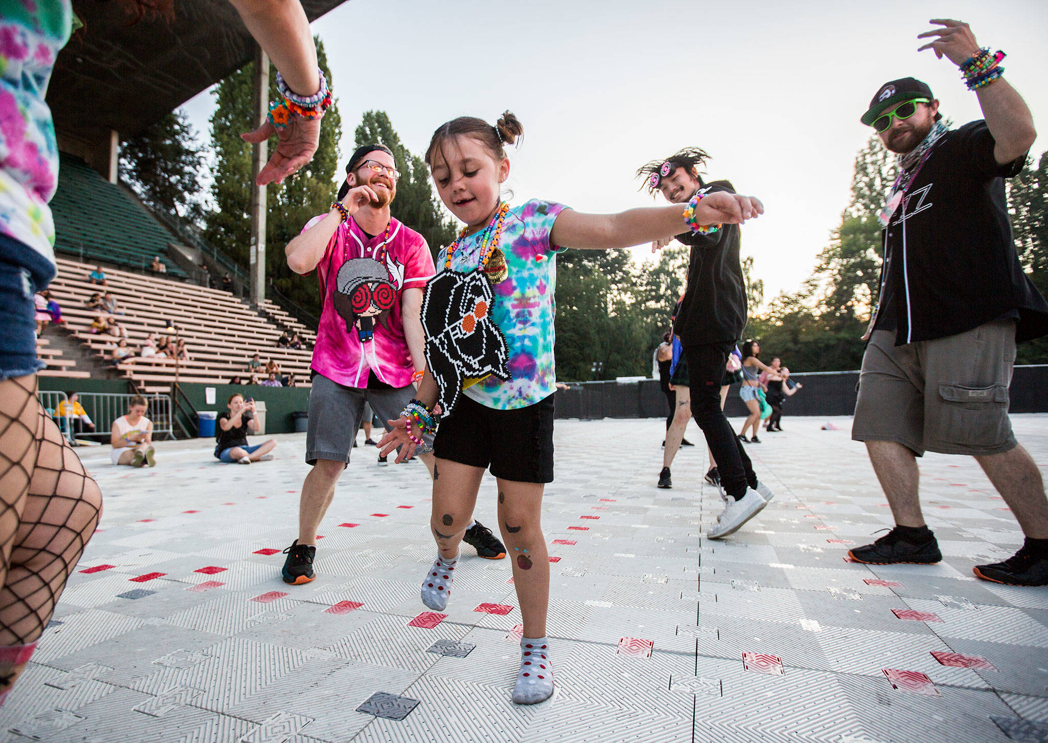 Skye Bassett, 6, dances with her family during Jai Wolfs rescheduled performance at Bumbershoot Music & Arts Festival on Sunday, Sept. 1, 2019 in Seattle, Wash. (Olivia Vanni / The Herald)